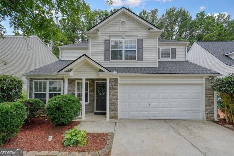 4 bedroom, 2.5 bathroom, 2,356 sq ft single family residence for sale at 115 Village Trace, Woodstock, GA 30188