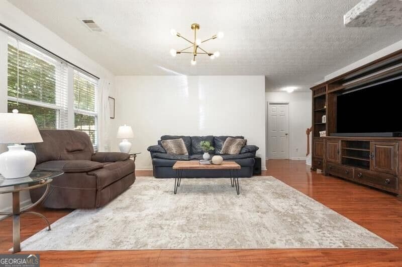 4 bedroom, 2.5 bathroom, 2,356 sq ft single family residence for sale at 115 Village Trace, Woodstock, GA 30188 — photo 10