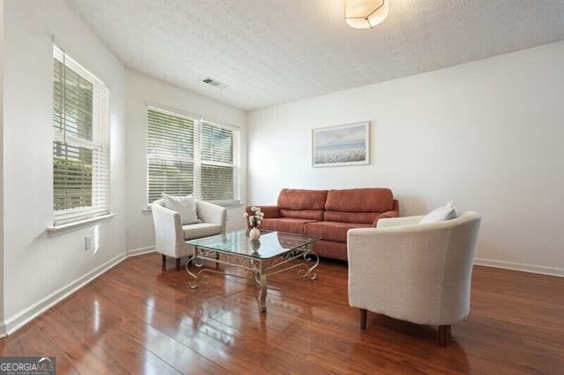 4 bedroom, 2.5 bathroom, 2,356 sq ft single family residence for sale at 115 Village Trace, Woodstock, GA 30188 — photo 4