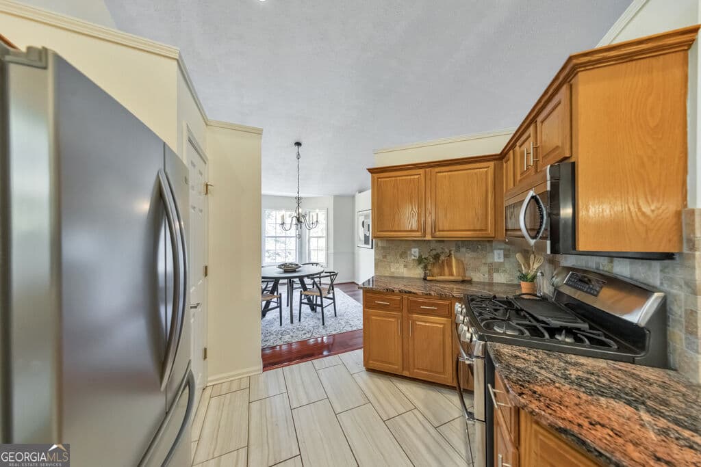 3 bedroom, 3 bathroom, 2,406 sq ft single family residence for sale at 2588 Kennesaw Springs Court, Kennesaw, GA 30144 — photo 4