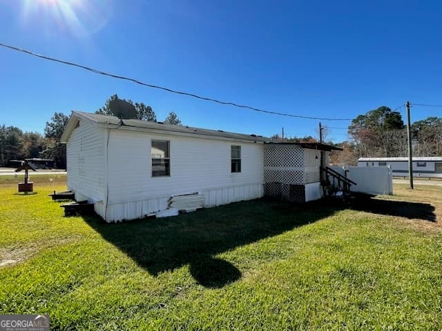 3 bedroom, 2 bathroom, 1,152 sq ft manufactured home,mobile home for sale at 28022 Us Highway 80, Portal, GA 30450 — photo 3
