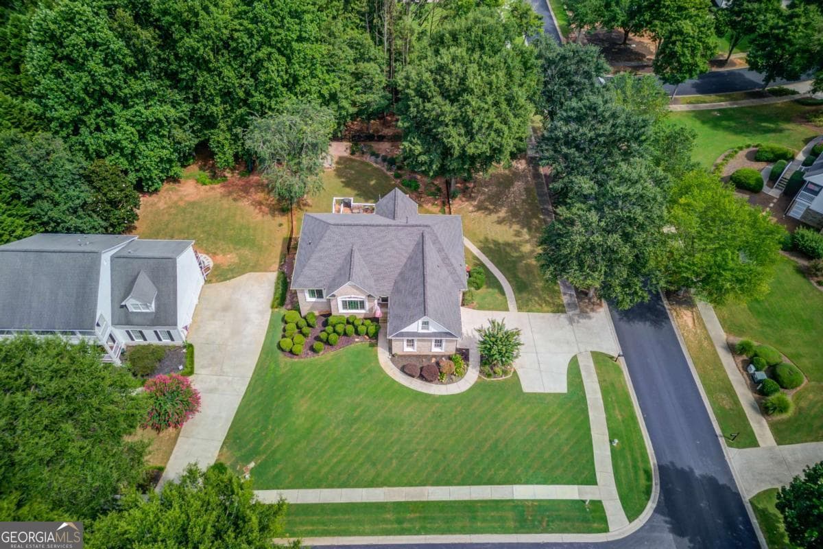 4 bedroom, 3.5 bathroom, 4,104 sq ft single family residence for sale at 880 Providence Club Drive, Monroe, GA 30656 — photo 2