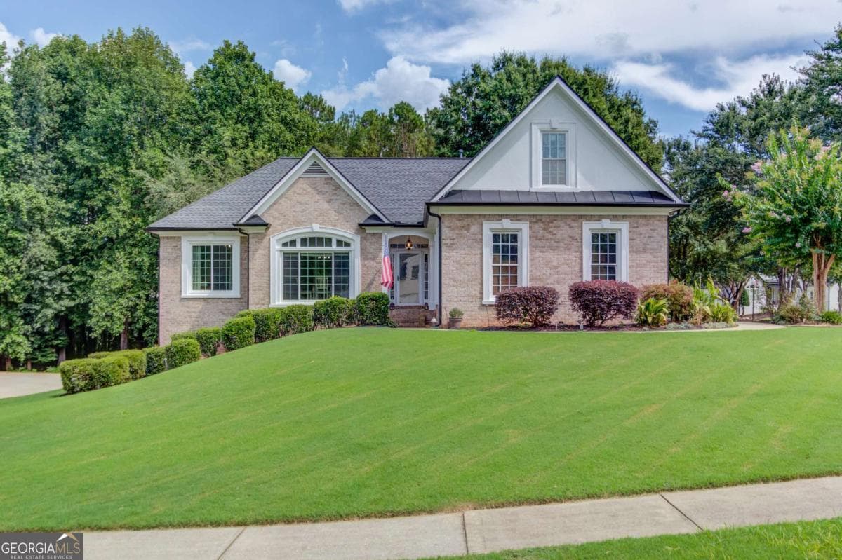 4 bedroom, 3.5 bathroom, 4,104 sq ft single family residence for sale at 880 Providence Club Drive, Monroe, GA 30656 — photo 3