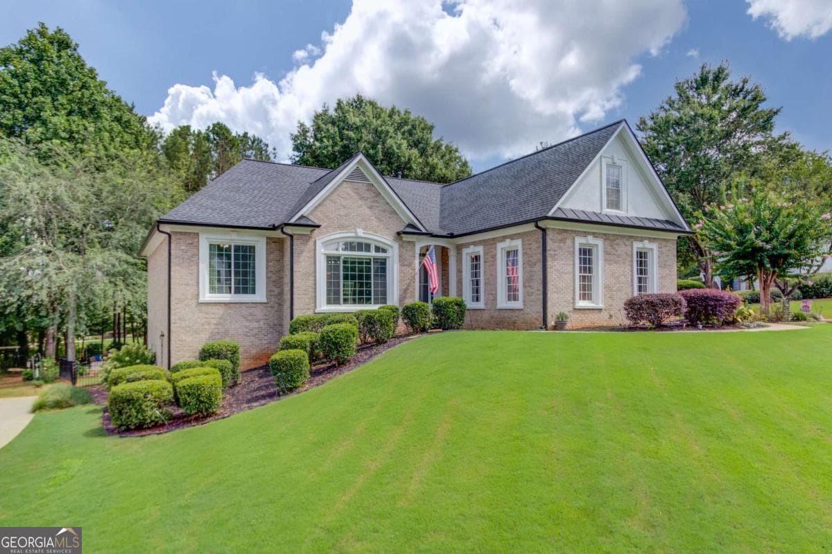 4 bedroom, 3.5 bathroom, 4,104 sq ft single family residence for sale at 880 Providence Club Drive, Monroe, GA 30656 — photo 1 of 66