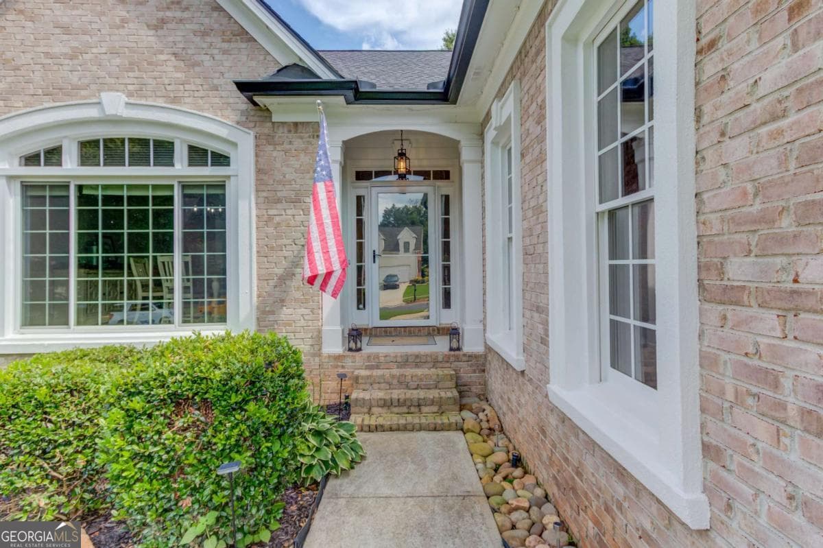 4 bedroom, 3.5 bathroom, 4,104 sq ft single family residence for sale at 880 Providence Club Drive, Monroe, GA 30656 — photo 4