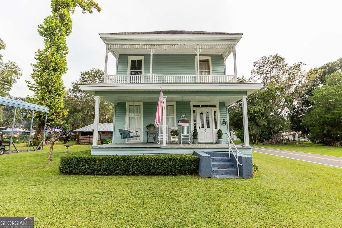 2 bedroom, 1.5 bathroom, 1,728 sq ft single family residence sold at 225 Oconee Avenue, Meldrim, GA 31318