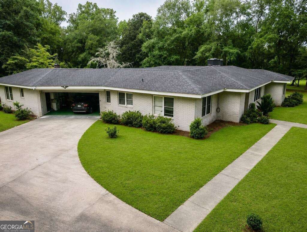 4 bedroom, 4 bathroom, 4,006 sq ft single family residence for sale at 1002 Jackson Street Extension, Vidalia, GA 30474 — photo 2