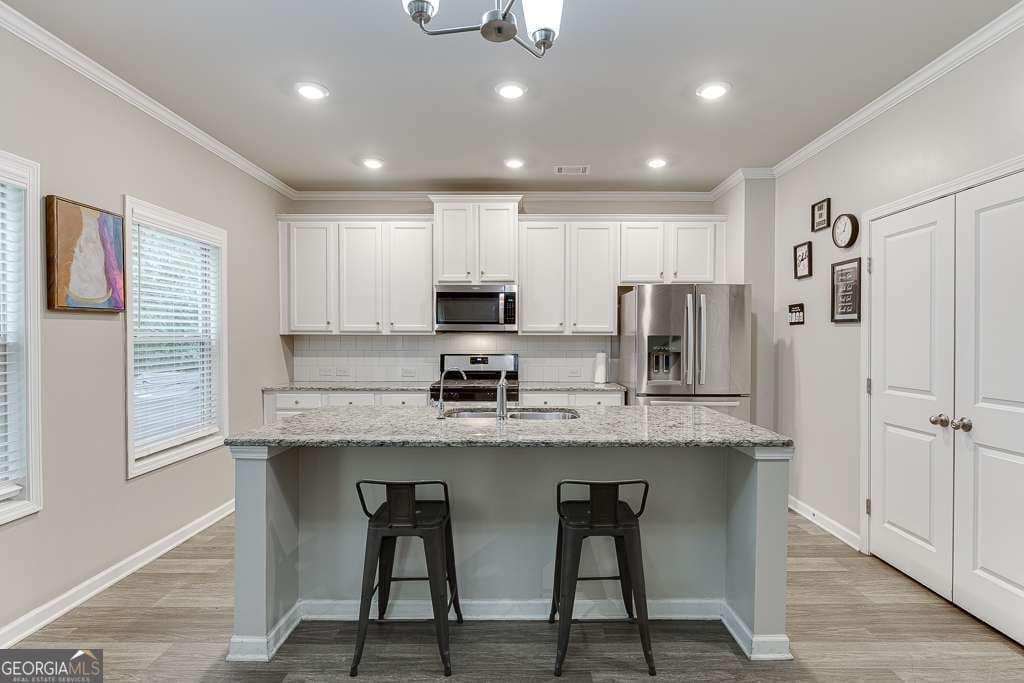 4 bedroom, 2.5 bathroom, 2,130 sq ft single family residence for sale at 23 Dorset Way, Hoschton, GA 30548 — photo 9