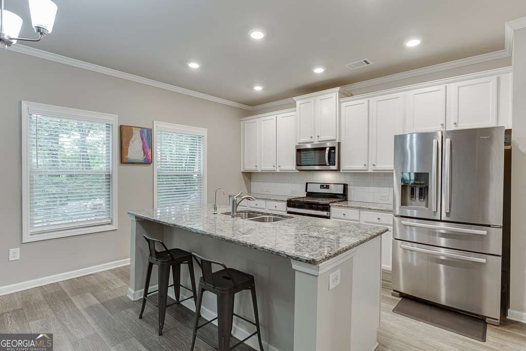 4 bedroom, 2.5 bathroom, 2,130 sq ft single family residence for sale at 23 Dorset Way, Hoschton, GA 30548 — photo 8