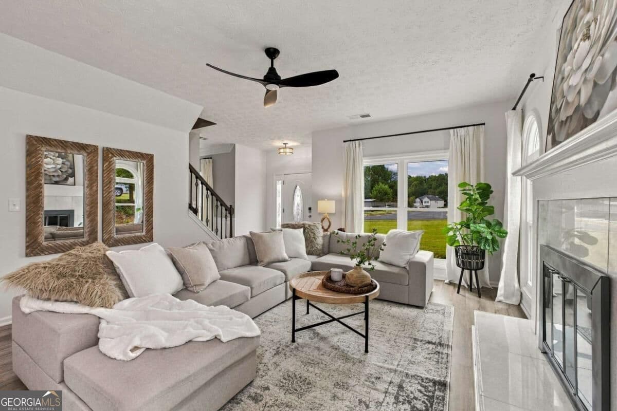 4 bedroom, 2.5 bathroom, 2,340 sq ft single family residence for sale at 3400 Duncan Bridge Drive, Buford, GA 30519 — photo 2