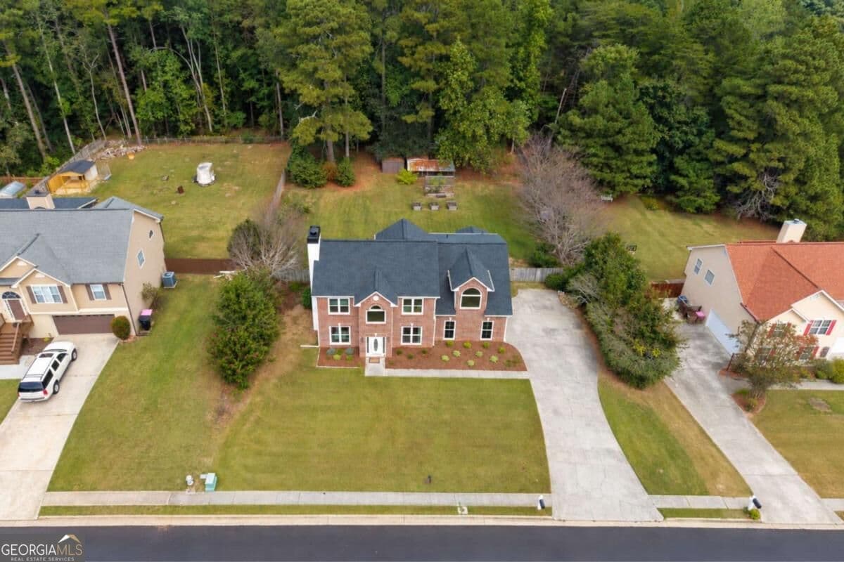 4 bedroom, 2.5 bathroom, 2,340 sq ft single family residence for sale at 3400 Duncan Bridge Drive, Buford, GA 30519 — photo 5