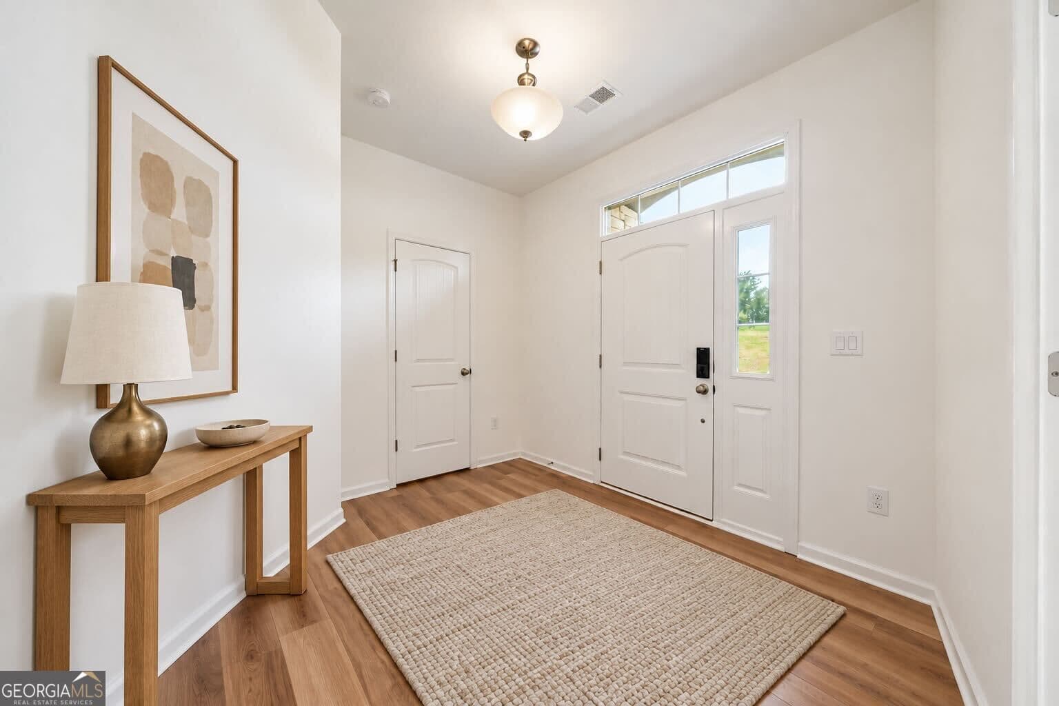 5 bedroom, 3.5 bathroom, 4,626 sq ft single family residence for sale at 8150 Scenic Ridge Way, Ball Ground, GA 30107 — photo 8