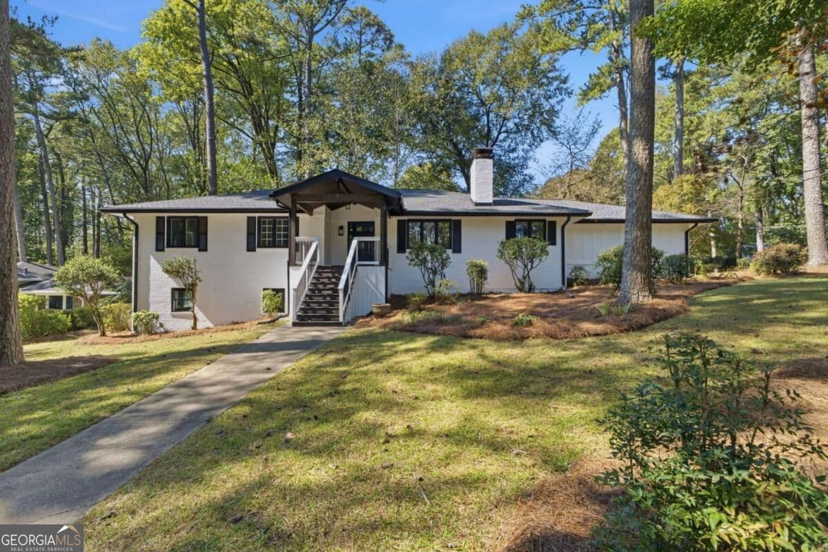 5 bedroom, 4 bathroom, 3,724 sq ft single family residence for sale at 2448 Sherbrooke Court, Atlanta, GA 30345 — photo 1 of 52