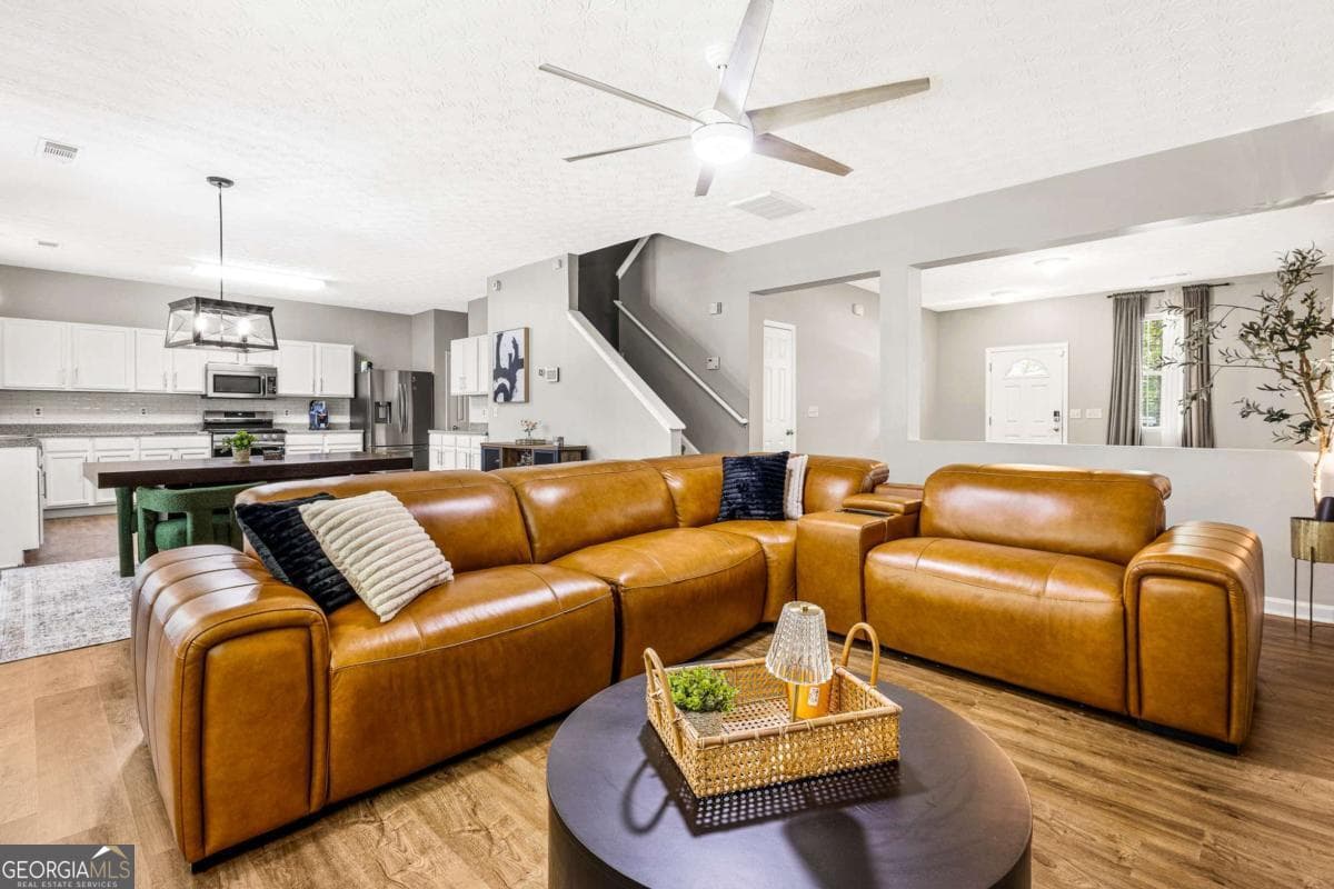 4 bedroom, 2.5 bathroom, 2,166 sq ft single family residence for sale at 3187 Sable Run Road, Atlanta, GA 30349 — photo 2