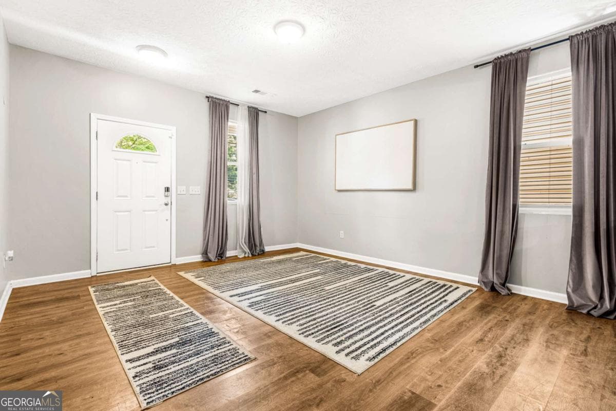 4 bedroom, 2.5 bathroom, 2,166 sq ft single family residence for sale at 3187 Sable Run Road, Atlanta, GA 30349 — photo 5