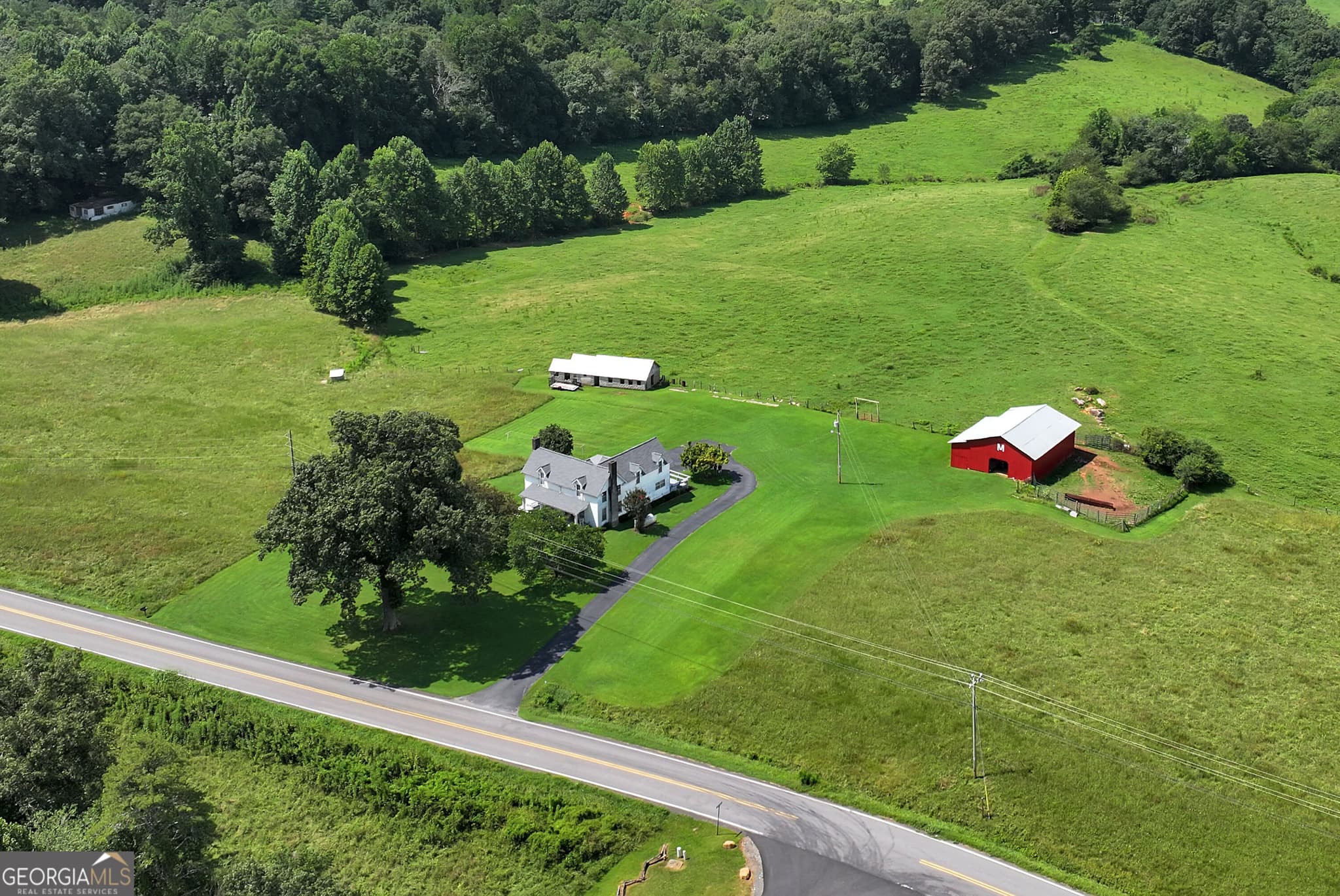 4 bedroom, 2 bathroom, 2,448 sq ft single family residence for sale at 4041 Ada Street, Blue Ridge, GA 30513 — photo 2