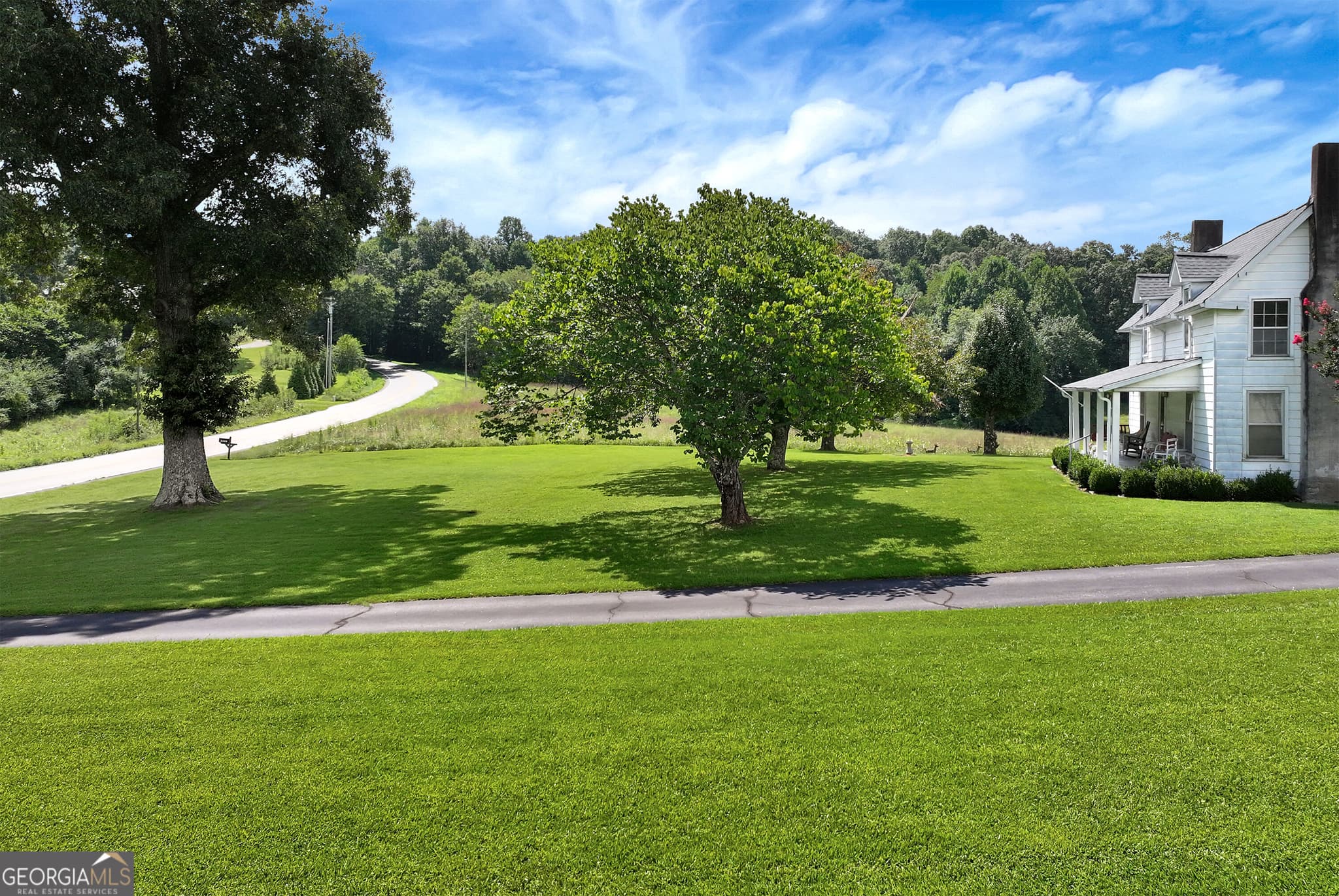 4 bedroom, 2 bathroom, 2,448 sq ft single family residence for sale at 4041 Ada Street, Blue Ridge, GA 30513 — photo 4