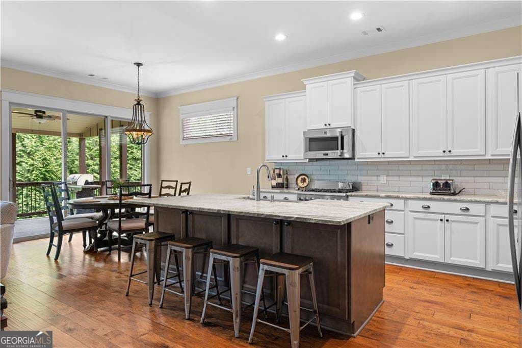 3 bedroom, 3 bathroom single family residence for sale at 1307 Magnolia Path Way, Buford, GA 30518 — photo 6