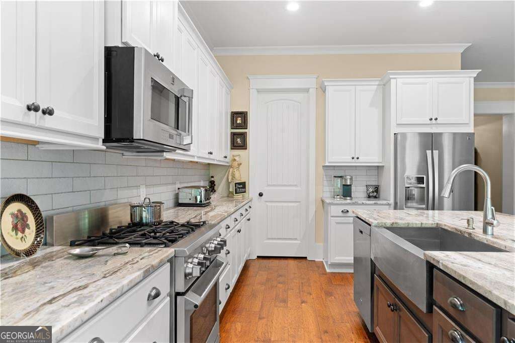 3 bedroom, 3 bathroom single family residence for sale at 1307 Magnolia Path Way, Buford, GA 30518 — photo 7