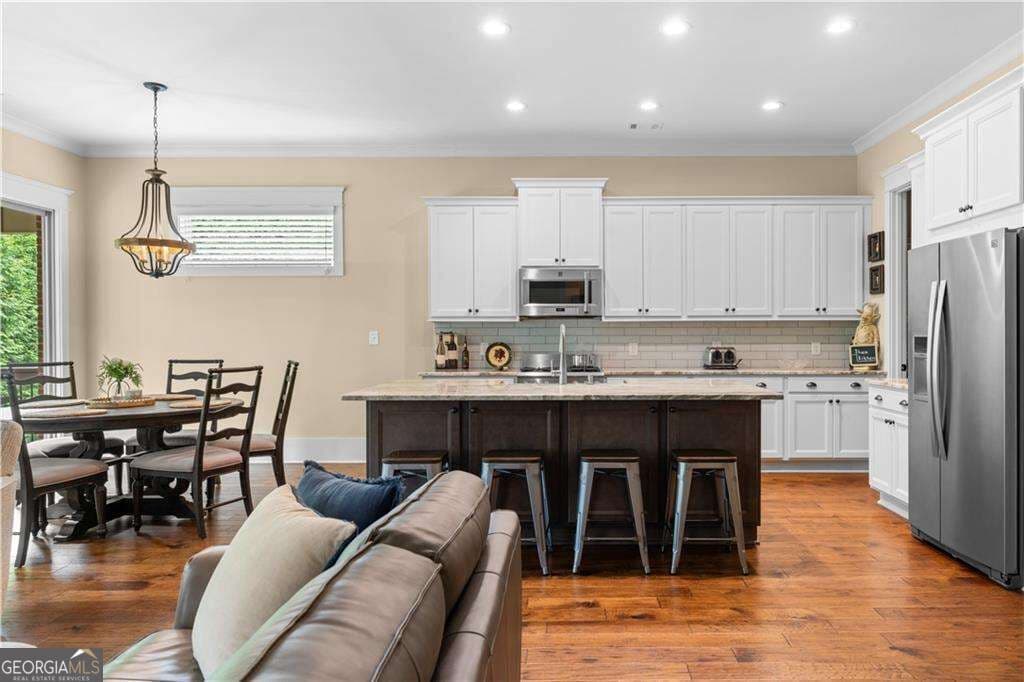 3 bedroom, 3 bathroom single family residence for sale at 1307 Magnolia Path Way, Buford, GA 30518 — photo 5