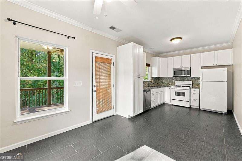 4 bedroom, 2.5 bathroom single family residence for sale at 2559 Paul Avenue, Atlanta, GA 30318 — photo 9