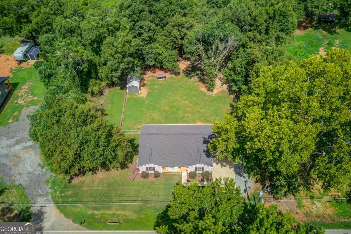 3 bedroom, 2 bathroom, 1,411 sq ft single family residence for sale at 418 Starrs Bridge Road, Canon, GA 30520 — photo 2