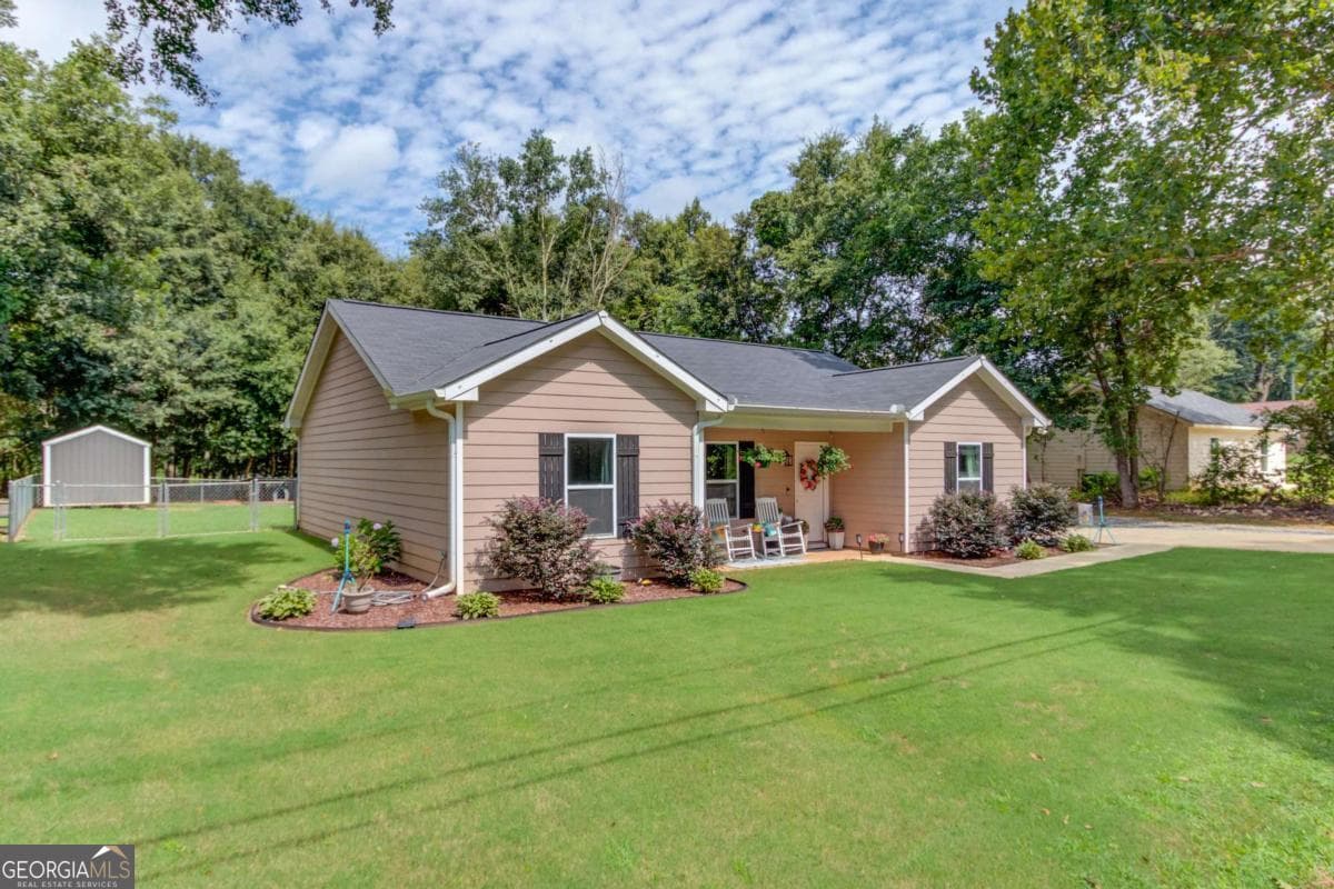 3 bedroom, 2 bathroom, 1,411 sq ft single family residence for sale at 418 Starrs Bridge Road, Canon, GA 30520 — photo 3