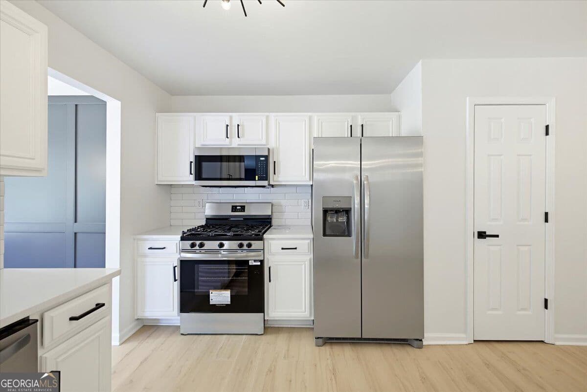4 bedroom, 2.5 bathroom single family residence for sale at 7274 Mountain Laurel Way, Stockbridge, GA 30281 — photo 7