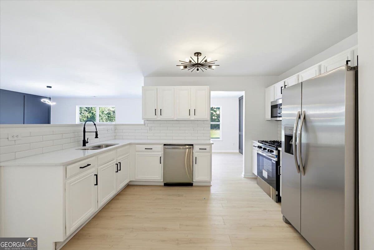 4 bedroom, 2.5 bathroom single family residence for sale at 7274 Mountain Laurel Way, Stockbridge, GA 30281 — photo 5