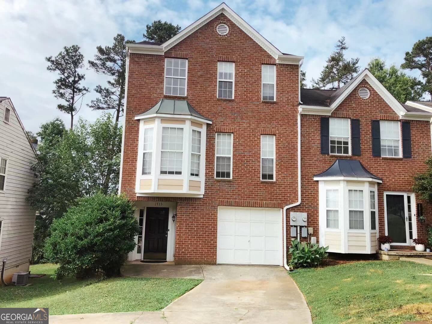 3 bedroom, 2.5 bathroom, 1,596 sq ft townhouse for rent at 1713 Barrington Overlook, Marietta, GA 30066 for $1,995 a month — photo 1 of 17