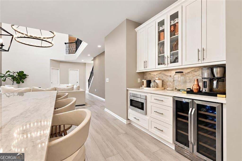 5 bedroom, 5 bathroom, 4,352 sq ft single family residence for sale at 6190 Vista Crossing Way, Cumming, GA 30028 — photo 8