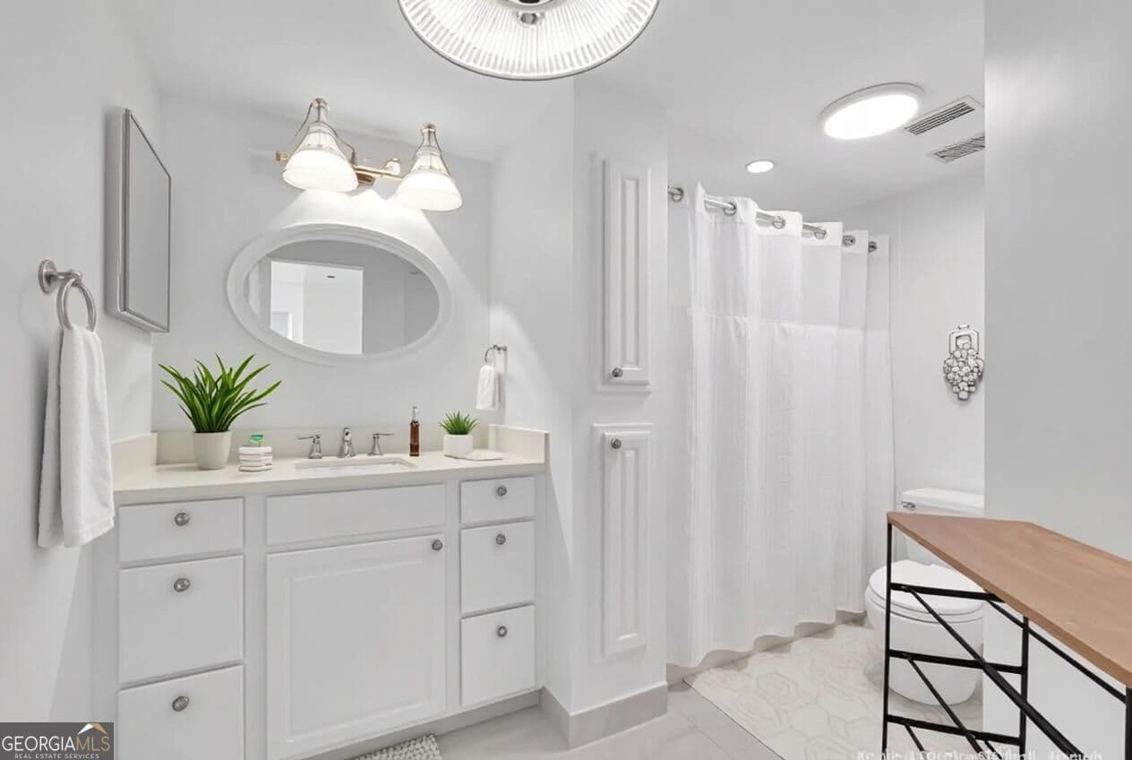 1 bedroom, 1 bathroom, 703 sq ft condominium for sale at 795 Hammond Drive 1005, Sandy Springs, GA 30328 — photo 3