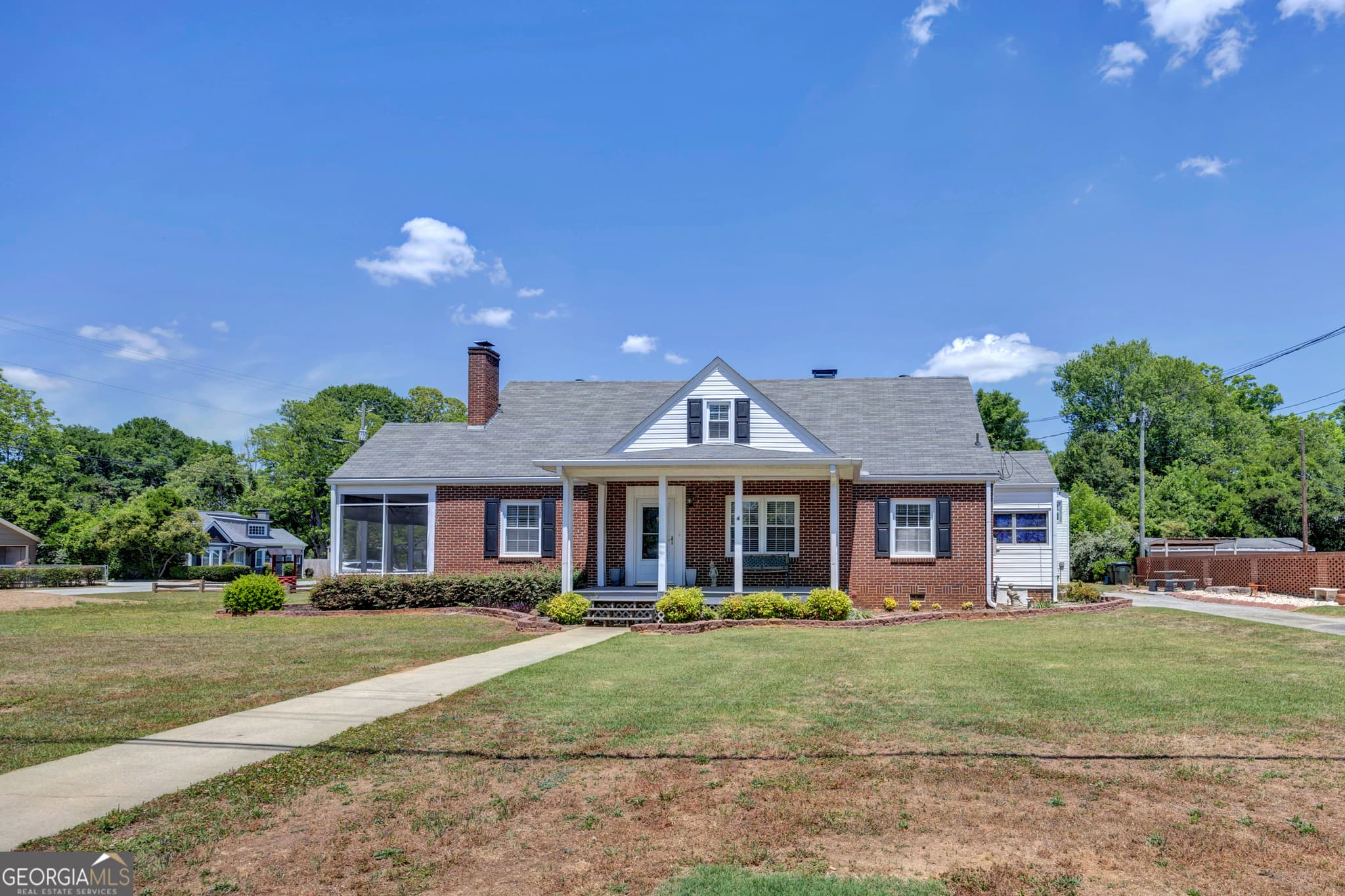 5 bedroom, 1.5 bathroom, 3,122 sq ft single family residence for sale at 6127 Newton Drive, Covington, GA 30014 — photo 2