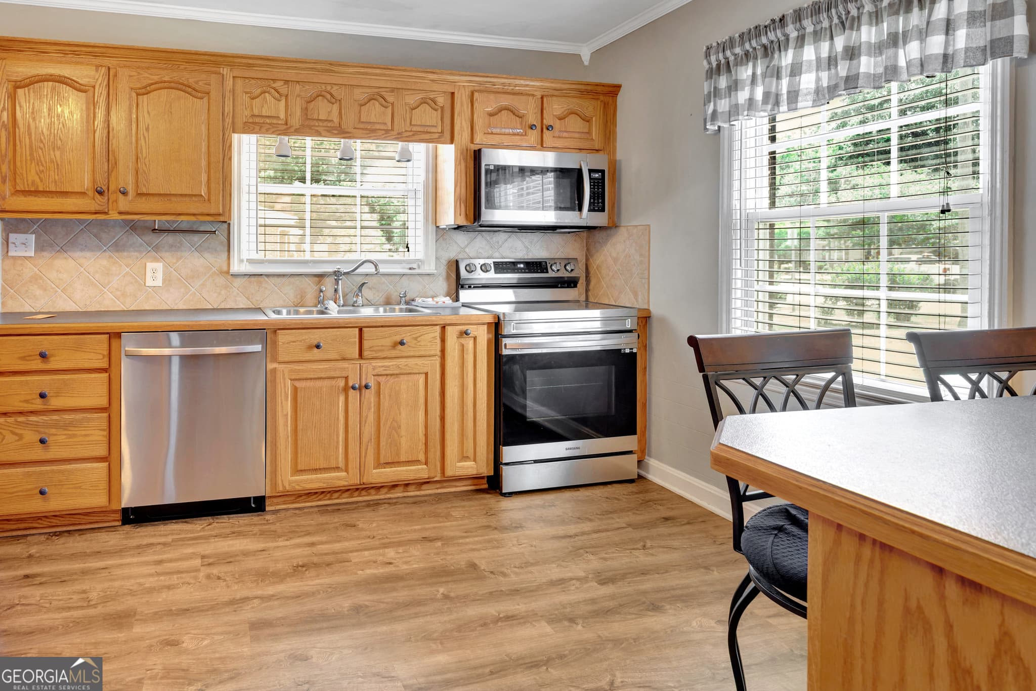 5 bedroom, 1.5 bathroom, 3,122 sq ft single family residence for sale at 6127 Newton Drive, Covington, GA 30014 — photo 9