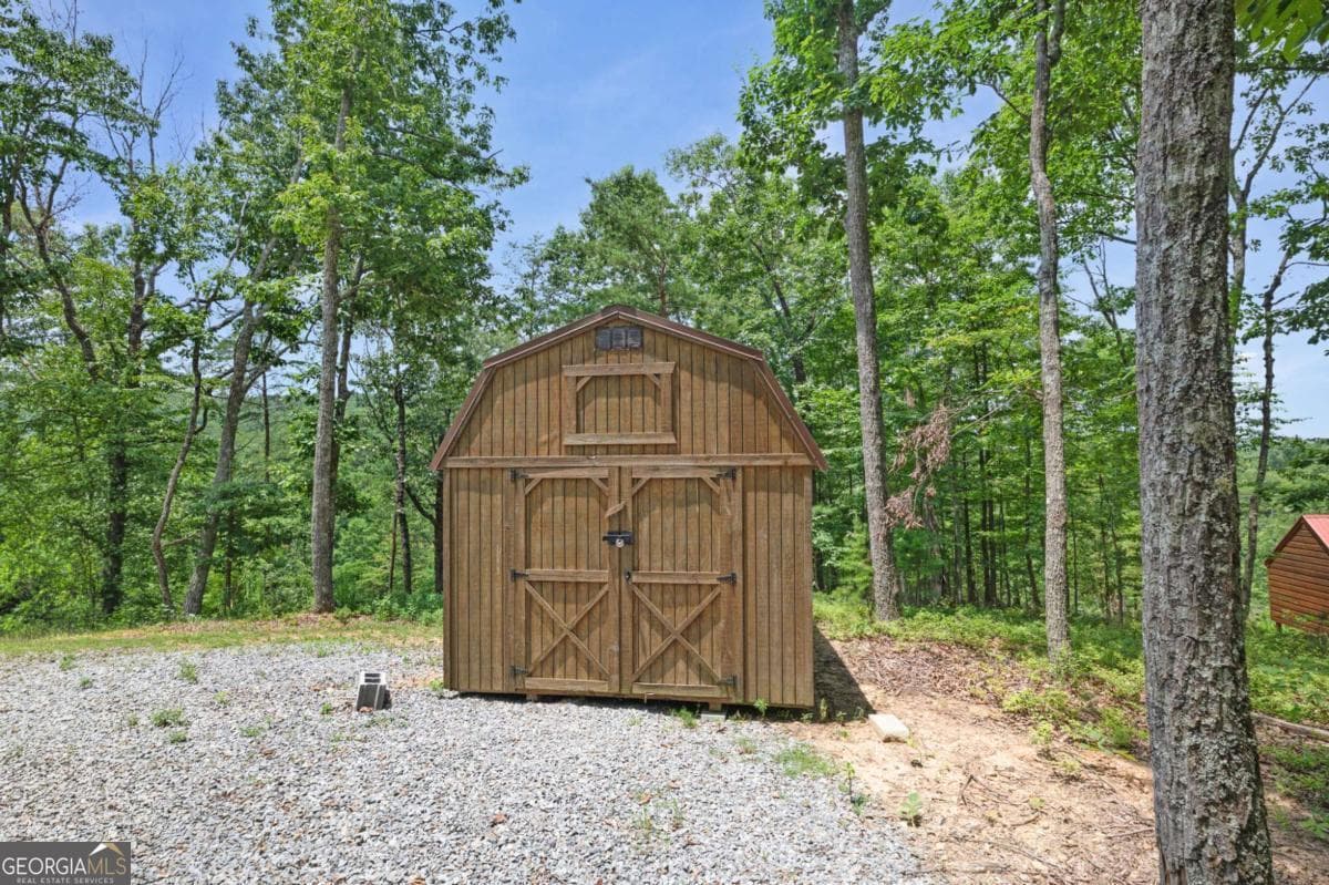 3 bedroom, 2 bathroom, 1,400 sq ft cabin,single family residence for sale at 1390 Foxhound Trail, Ranger, GA 30734 — photo 6