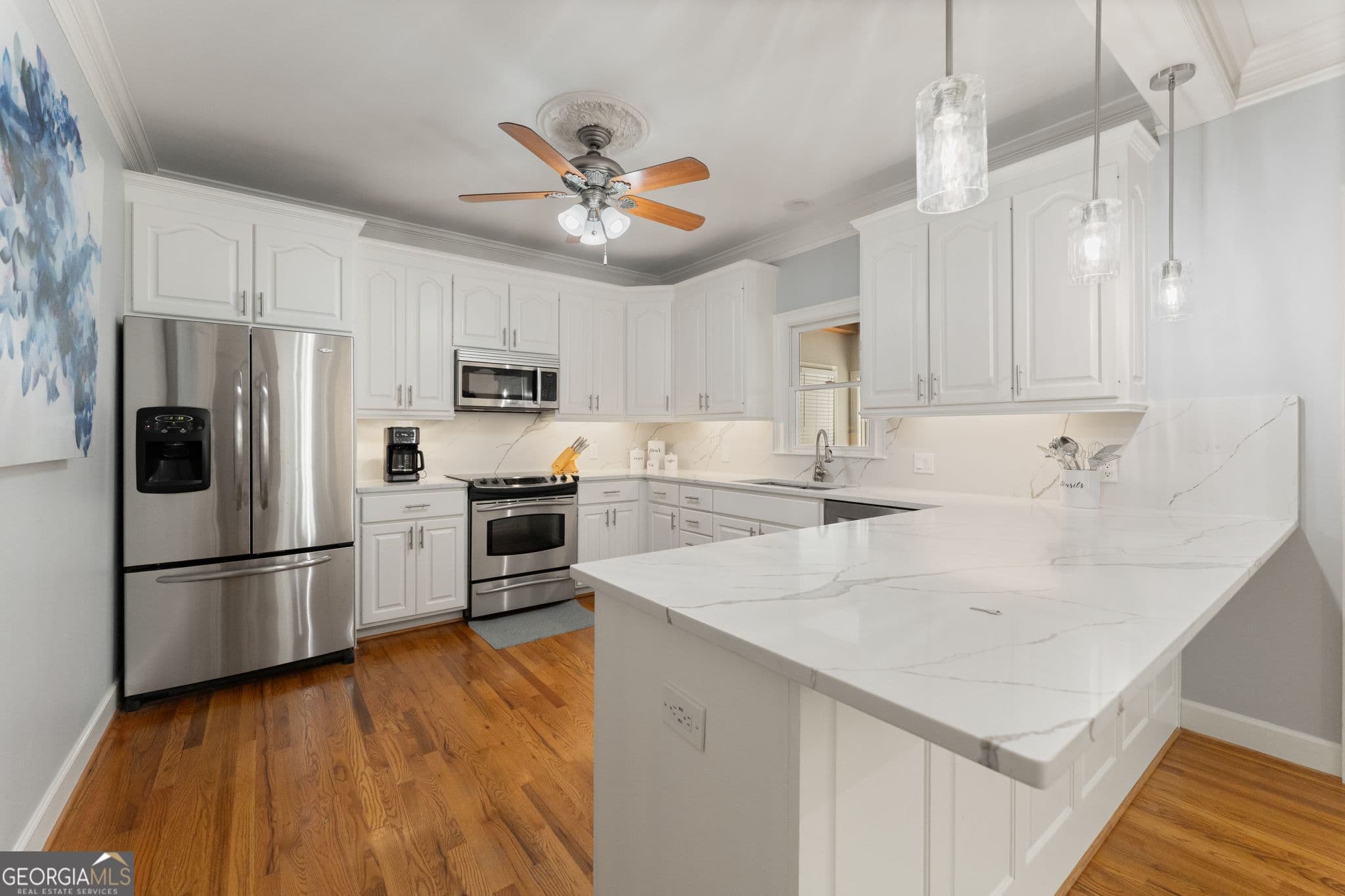 6 bedroom, 4.5 bathroom, 4,622 sq ft single family residence for sale at 5725 Ash Drive, Cumming, GA 30040 — photo 3