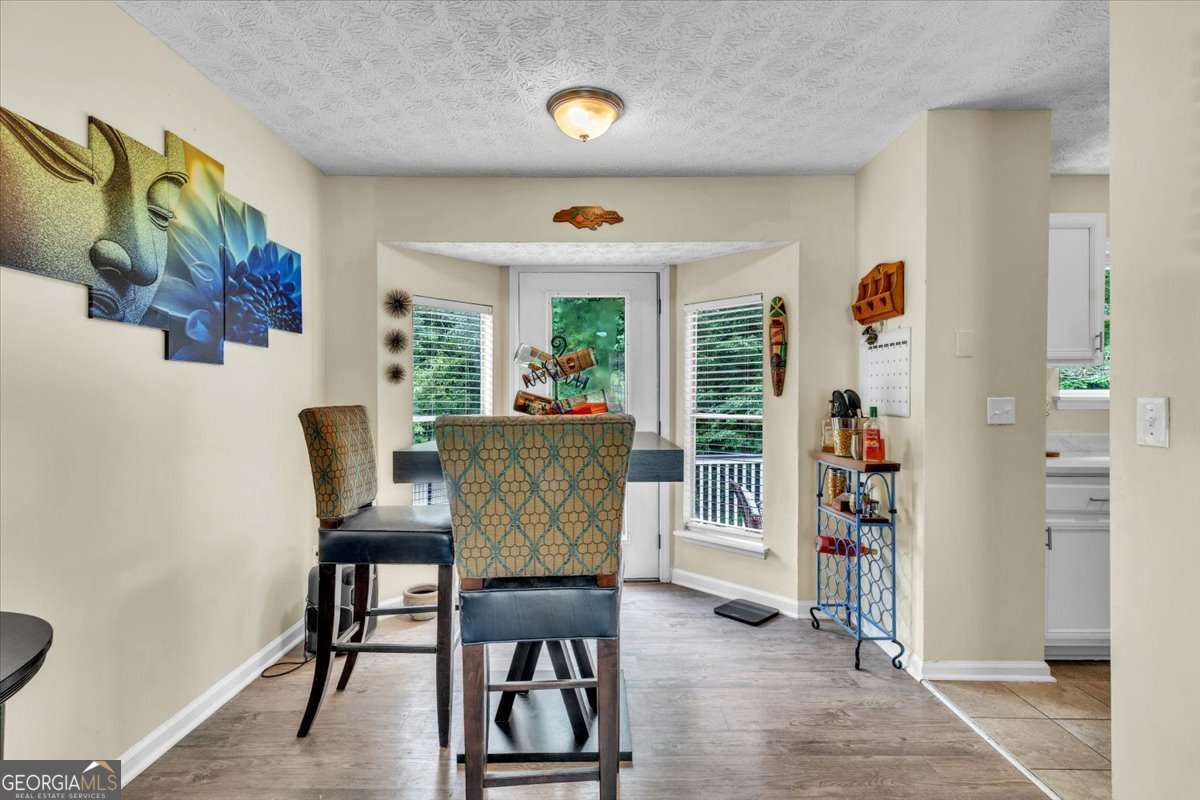 3 bedroom, 2 bathroom, 1,324 sq ft single family residence for sale at 5300 Forest Downs Lane, Atlanta, GA 30349 — photo 7