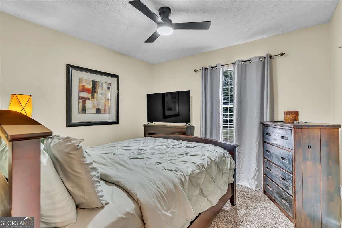 3 bedroom, 2 bathroom, 1,324 sq ft single family residence for sale at 5300 Forest Downs Lane, Atlanta, GA 30349 — photo 9