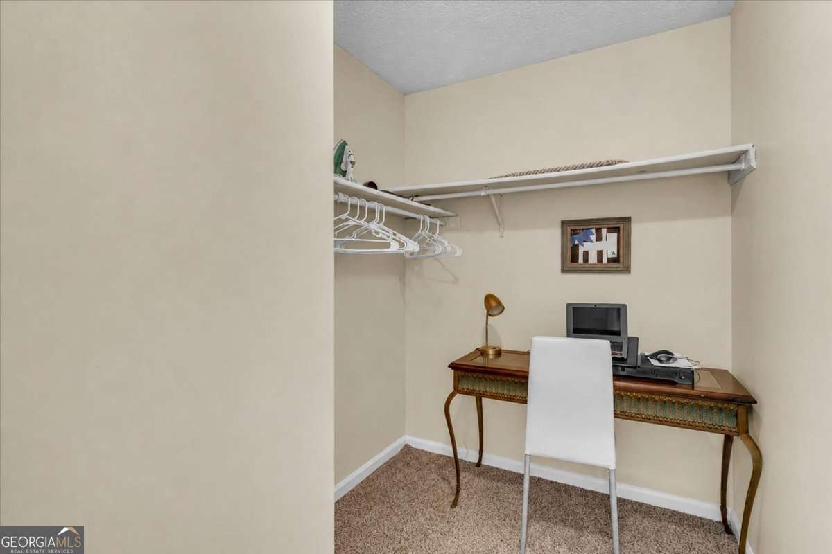 3 bedroom, 2 bathroom, 1,324 sq ft single family residence for sale at 5300 Forest Downs Lane, Atlanta, GA 30349 — photo 10