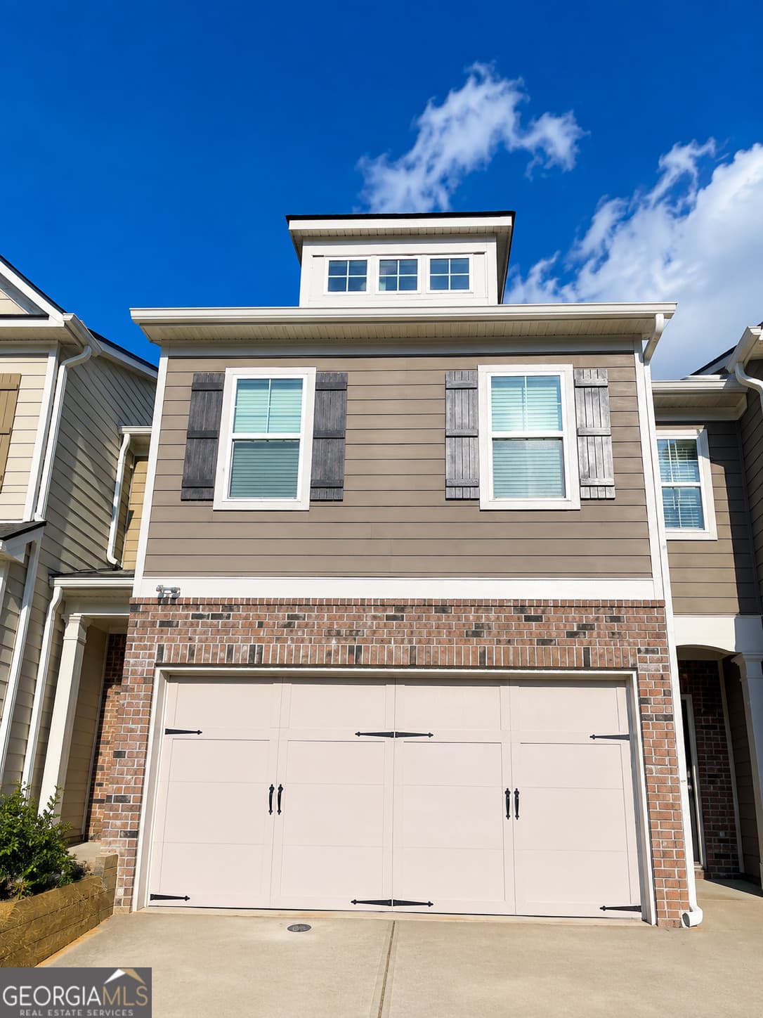 4 bedroom, 2.5 bathroom townhouse for sale at 7699 Baron Road, Fairburn, GA 30213 — photo 1 of 11