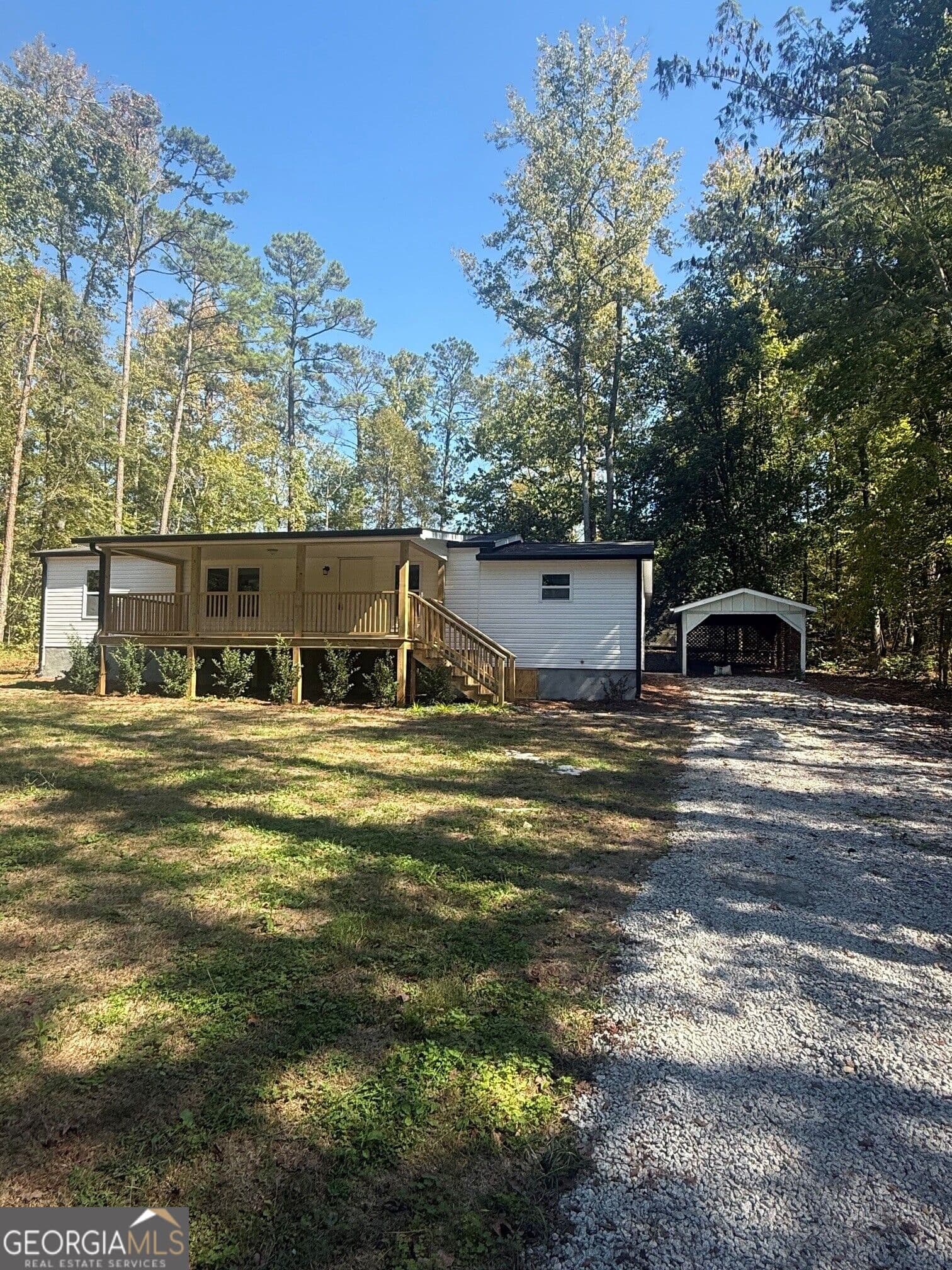 3 bedroom, 2 bathroom, 1,250 sq ft manufactured home,single family residence for sale at 1340 Lake Sinclair Drive, Sparta, GA 31087 — photo 2