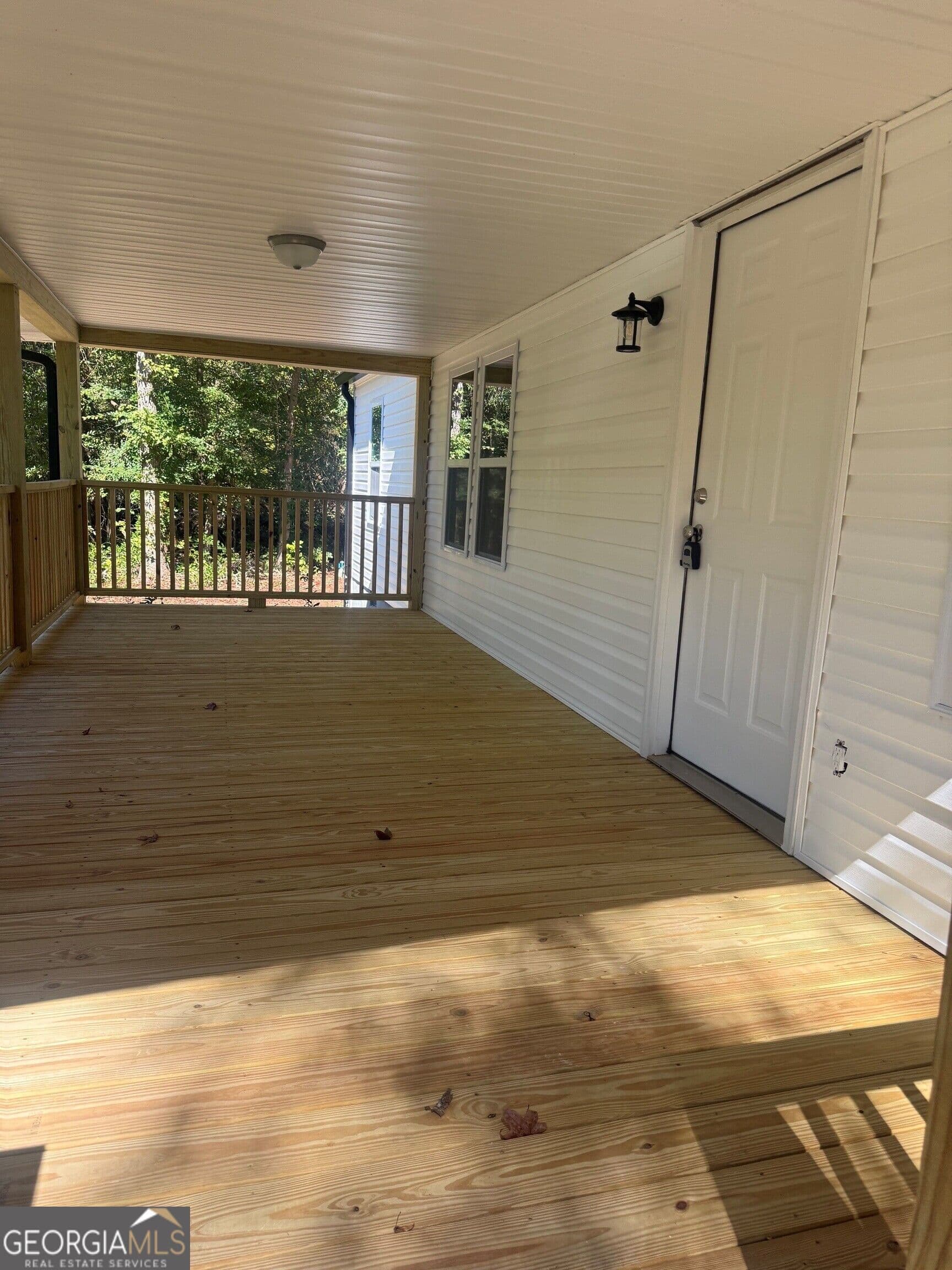 3 bedroom, 2 bathroom, 1,250 sq ft manufactured home,single family residence for sale at 1340 Lake Sinclair Drive, Sparta, GA 31087 — photo 3