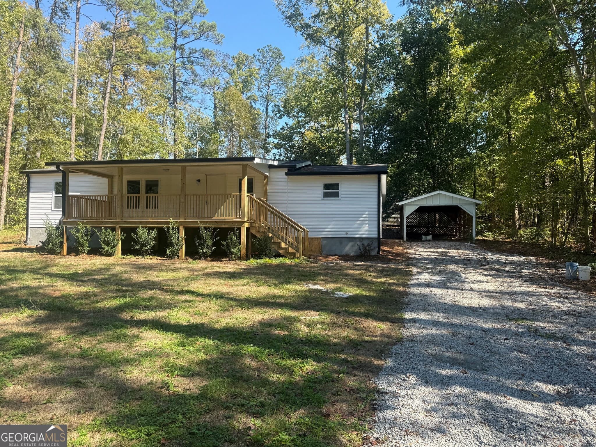 3 bedroom, 2 bathroom, 1,250 sq ft manufactured home,single family residence for sale at 1340 Lake Sinclair Drive, Sparta, GA 31087 — photo 1 of 7