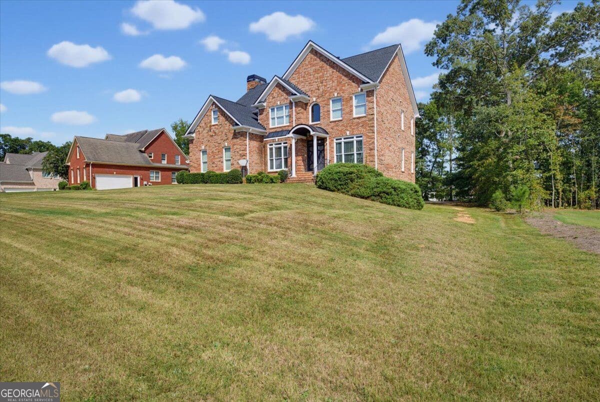 4 bedroom, 3 bathroom, 3,020 sq ft single family residence for sale at 144 Chapel Ridge Drive, Ellenwood, GA 30294 — photo 3