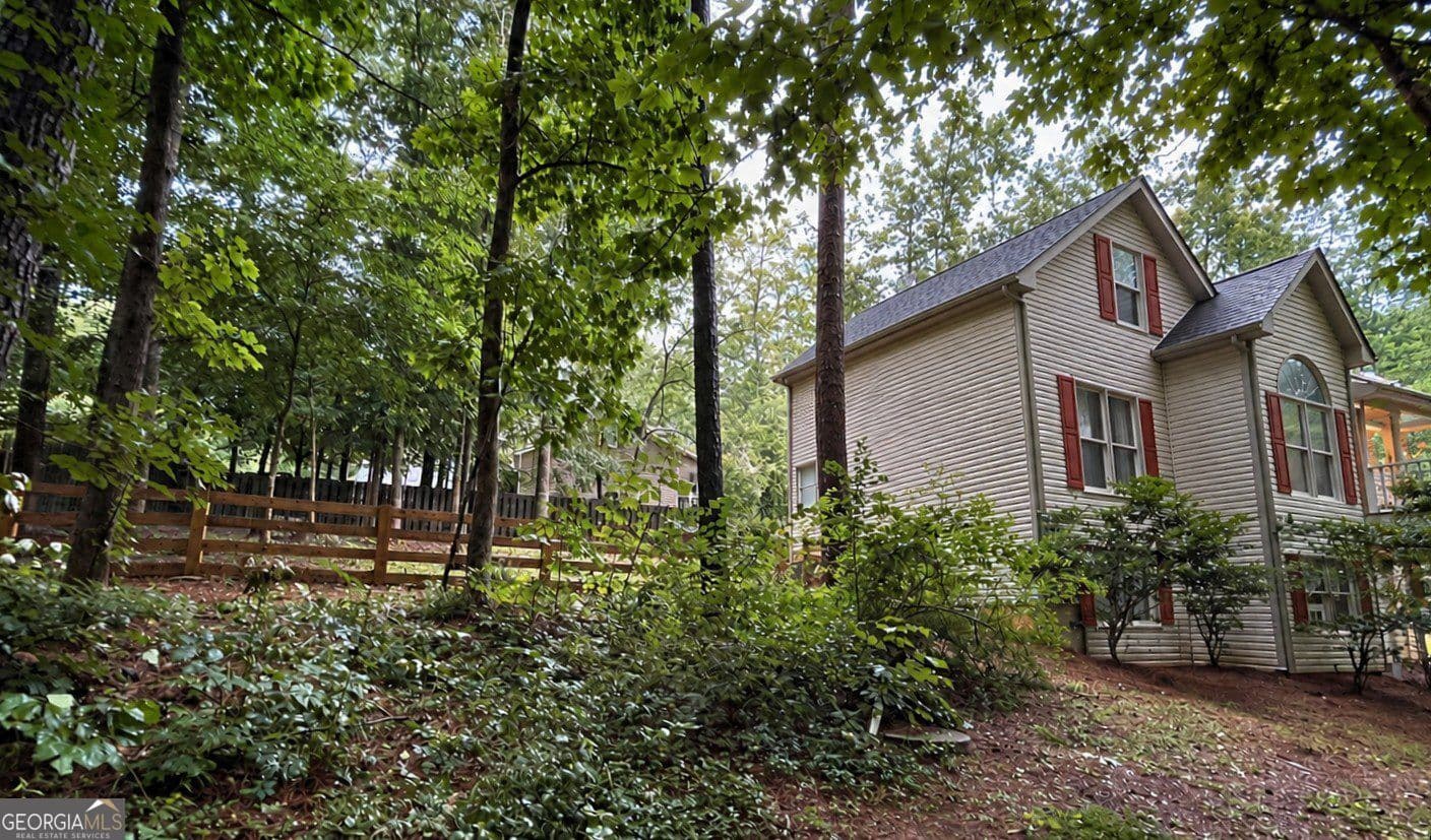4 bedroom, 2.5 bathroom, 2,844 sq ft single family residence for sale at 1024 Laurel Lake Drive, Ball Ground, GA 30107 — photo 7