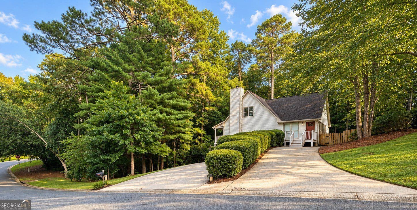 4 bedroom, 2.5 bathroom, 2,844 sq ft single family residence for sale at 1024 Laurel Lake Drive, Ball Ground, GA 30107 — photo 3