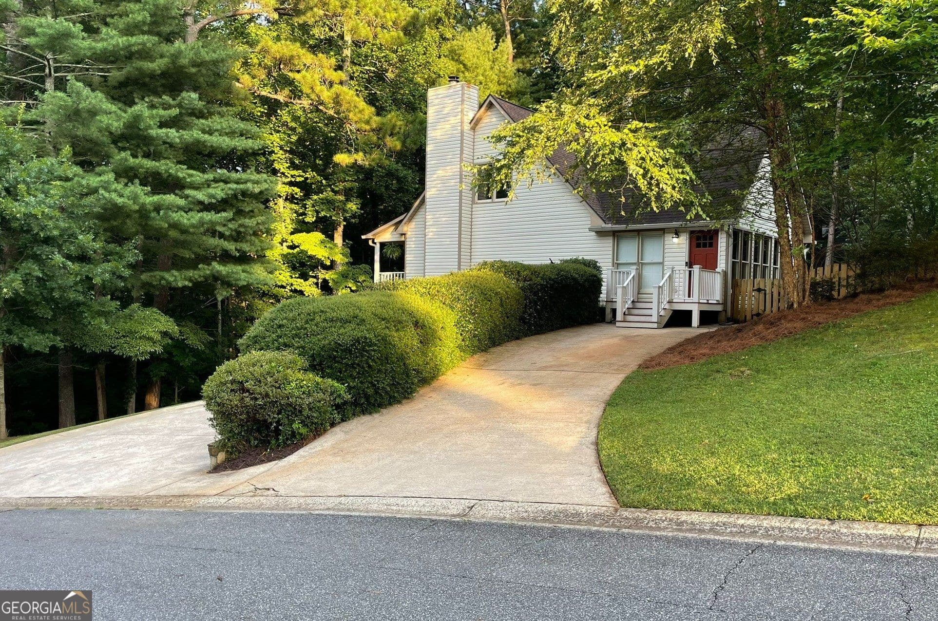 4 bedroom, 2.5 bathroom, 2,844 sq ft single family residence for sale at 1024 Laurel Lake Drive, Ball Ground, GA 30107 — photo 4
