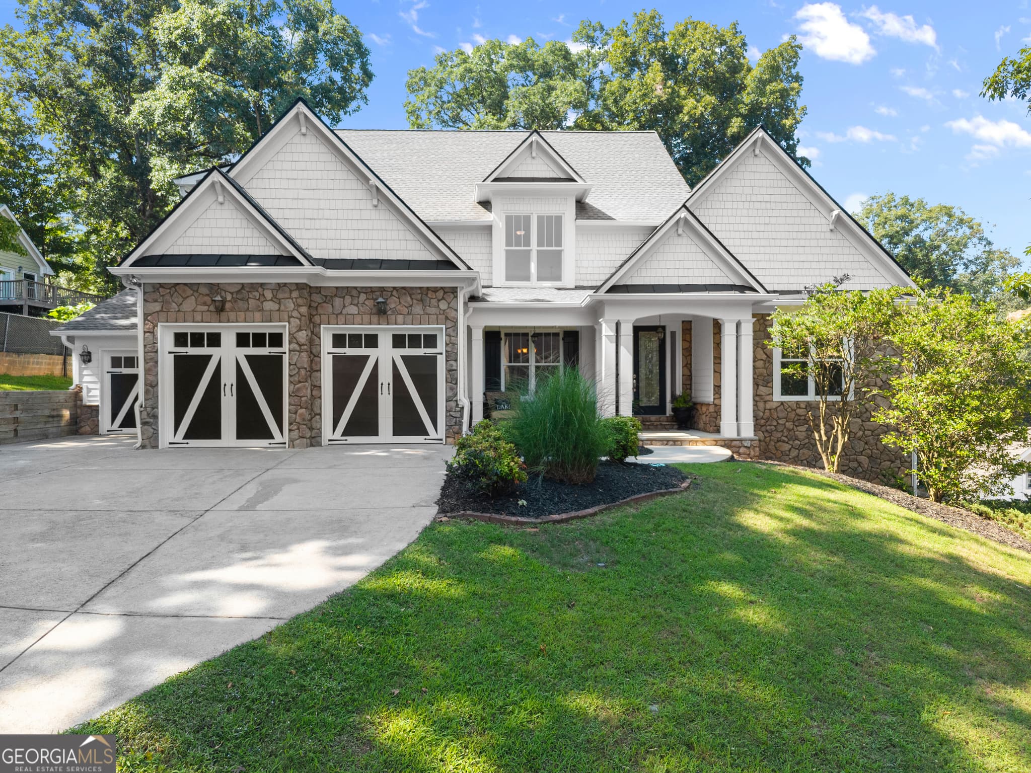 5 bedroom, 4.5 bathroom, 5,467 sq ft single family residence for sale at 3309 Chaney Circle, Gainesville, GA 30506 — photo 2