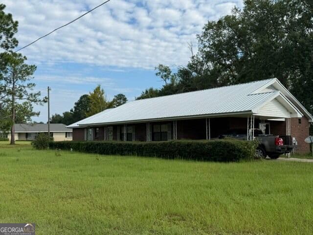 4 bedroom, 2 bathroom, 1,919 sq ft single family residence for sale at 44 Hilltop Drive, Lumber City, GA 31549 — photo 2