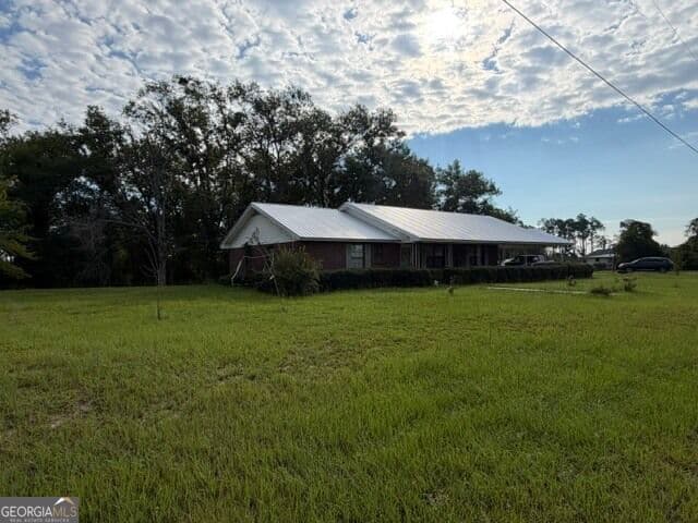 4 bedroom, 2 bathroom, 1,919 sq ft single family residence for sale at 44 Hilltop Drive, Lumber City, GA 31549 — photo 3